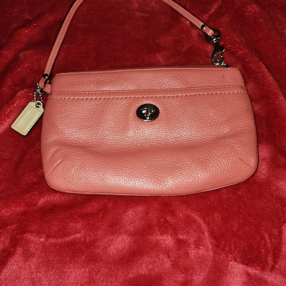 leather orange Coach wristlet purse